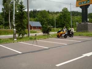 A couple of touring (motor)cyclist at the mountain reststop/stopover of Seiwa Onsen